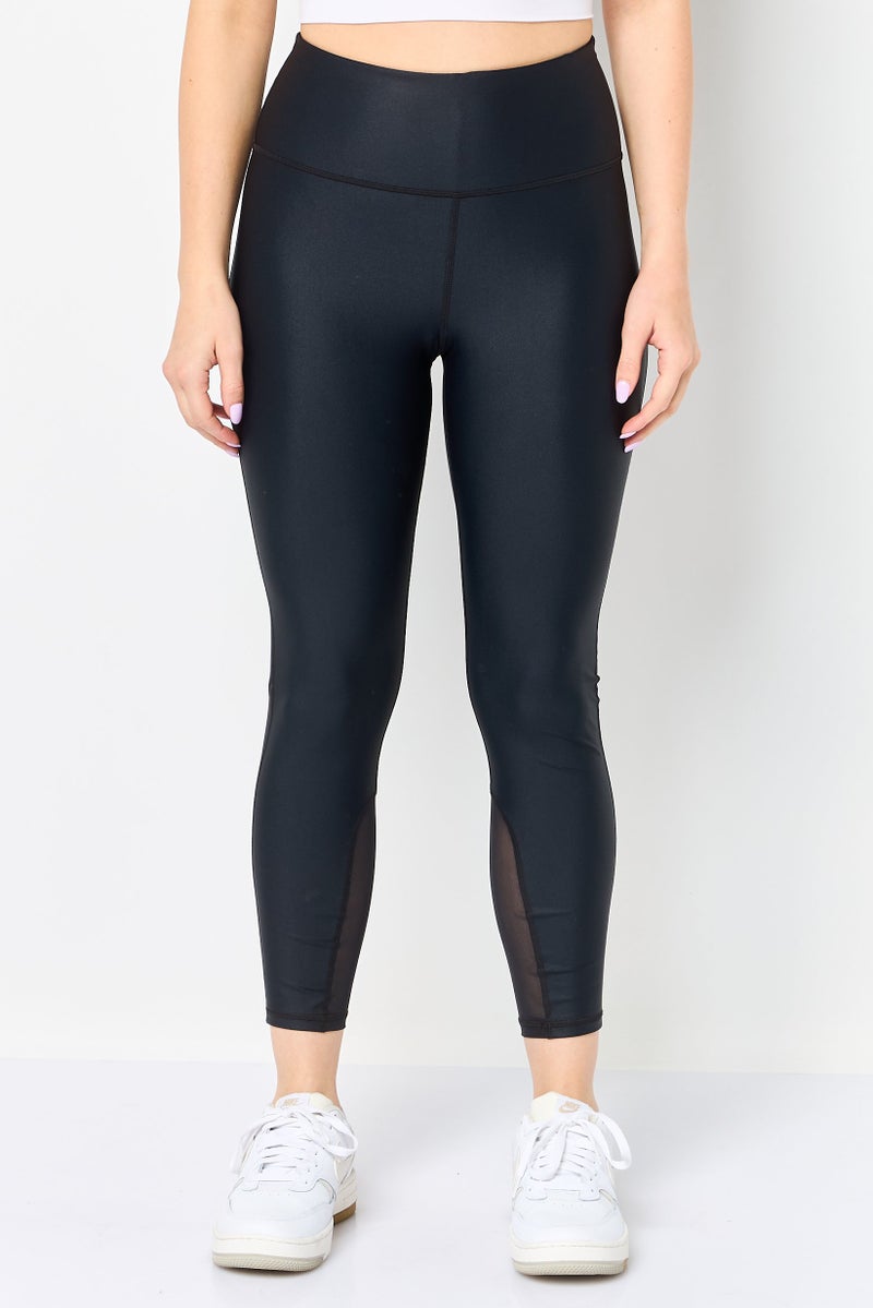 UNDER ARMOUR سراويل تدريب رياضية للنساء بشعار العلامة التجارية، سوداء - Image 1