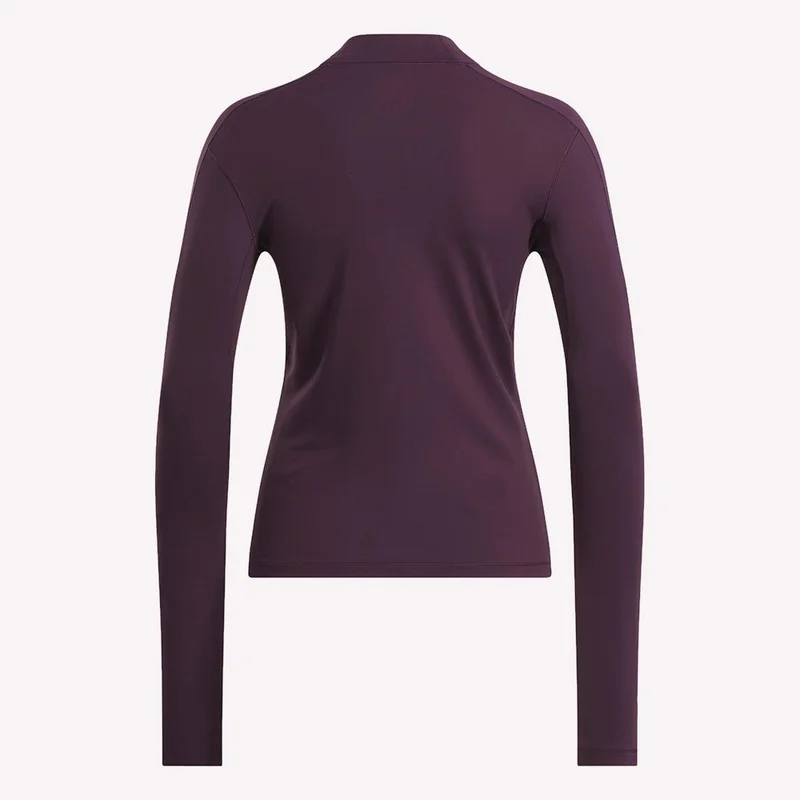 ريبوك A WARMING TEE WITH A SNUG FIT