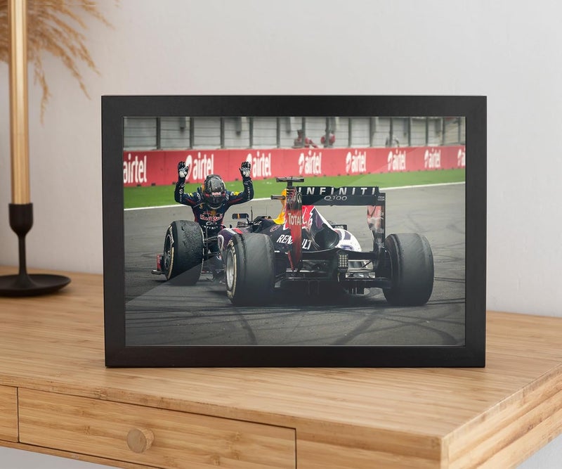 FRAMEO STORE Bowing the Bull Glass Frame Sebastian Vettel Indian GP 2013 Redbull RB9 wall art framed poster A4 size 8 X 12 Inches - Image 1