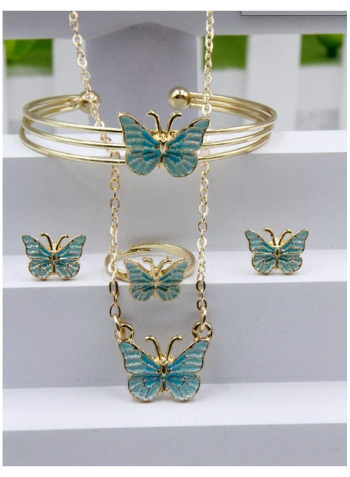 Elegant and distinctive women accessories set consisting of chain with butterfly-designed pendant earrings bracelet and ring  - Image 1