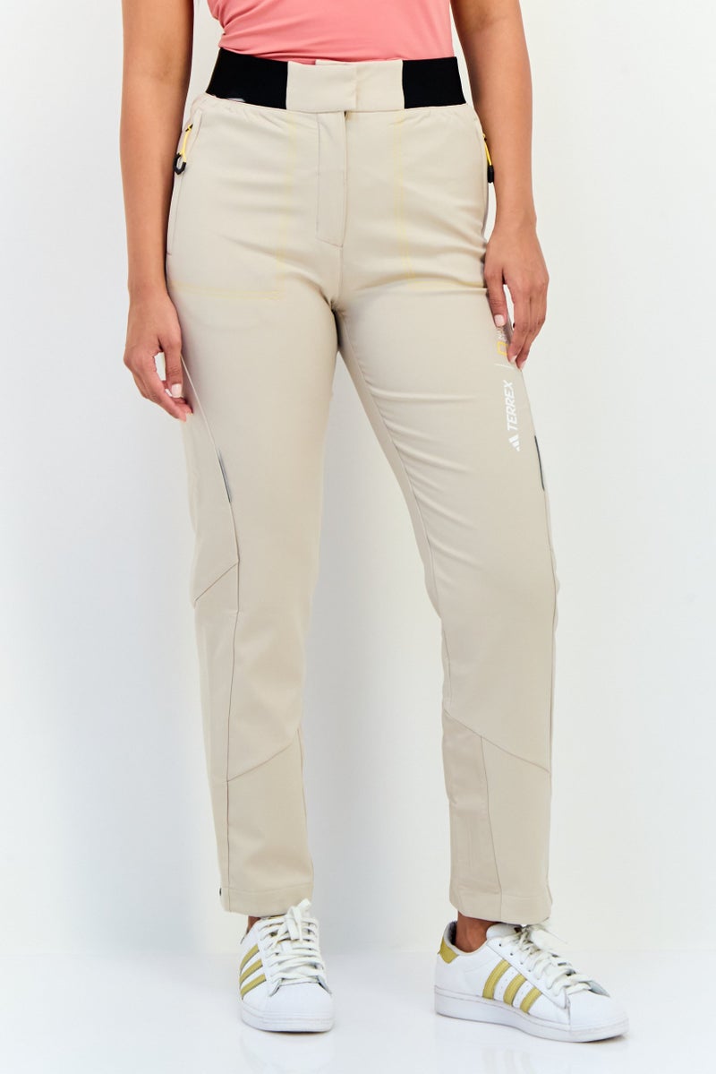 Adidas Women Sportswear Fit Outdoor Track Pants, Beige  - Image 1