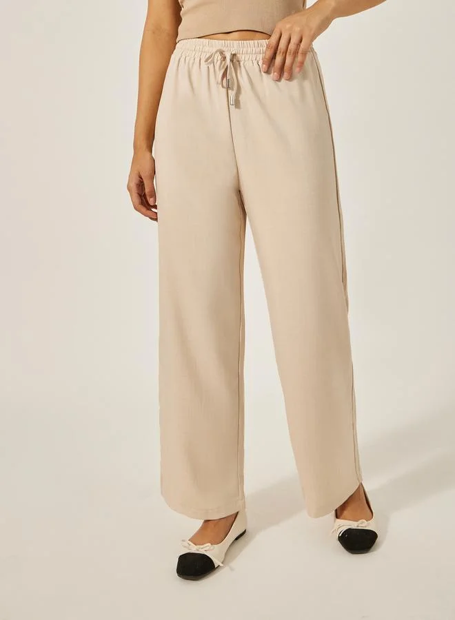 Styli Mid Rise Wide Leg Pants with Drawstring
