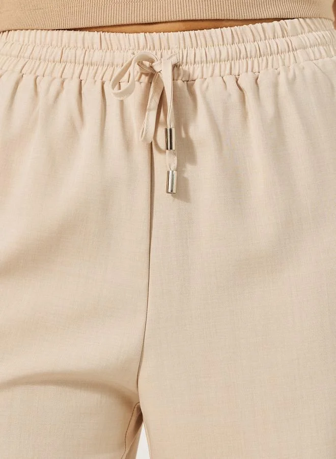 Styli Mid Rise Wide Leg Pants with Drawstring