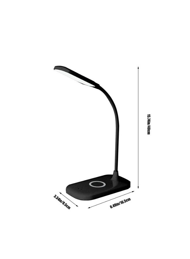 Modern LED Desk Lamp with Wireless Charging Pad This is a sleek, modern desk lamp featuring an adjustable LED light arm and an integrated wireless charging pad for smartphones. - Image 3