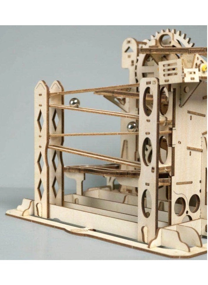 ROKR - 3D wooden puzzle game featuring a set of mechanical gears, a ball track, and a rotating elevator. - Image 1
