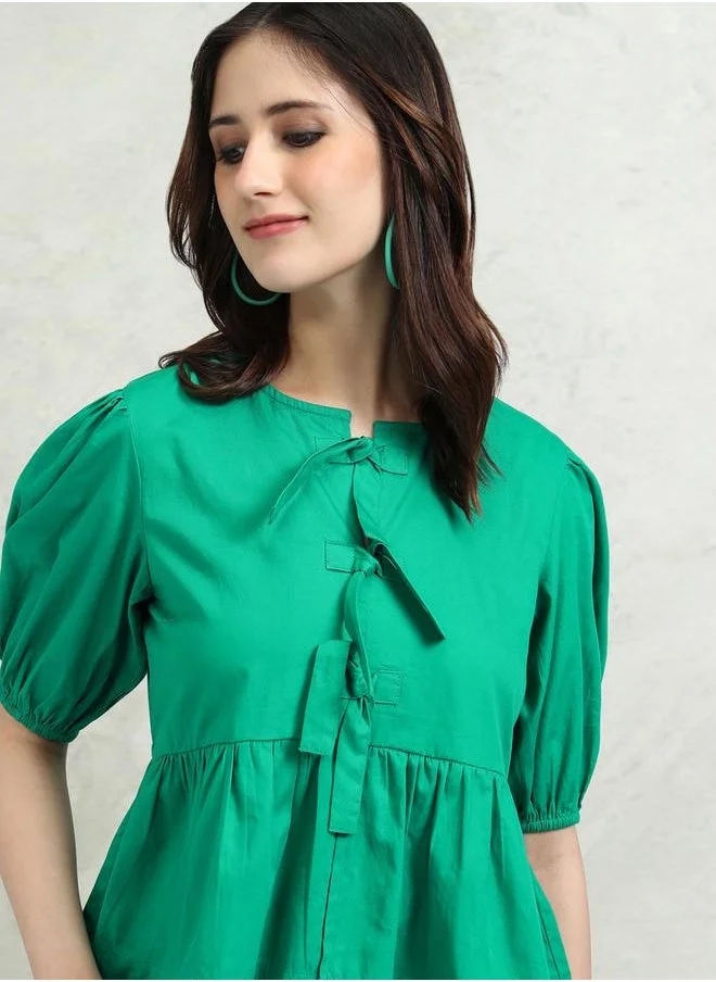 Tokyo Talkies Solid Puff Sleeve Top with Tie-Up Detail by Styli