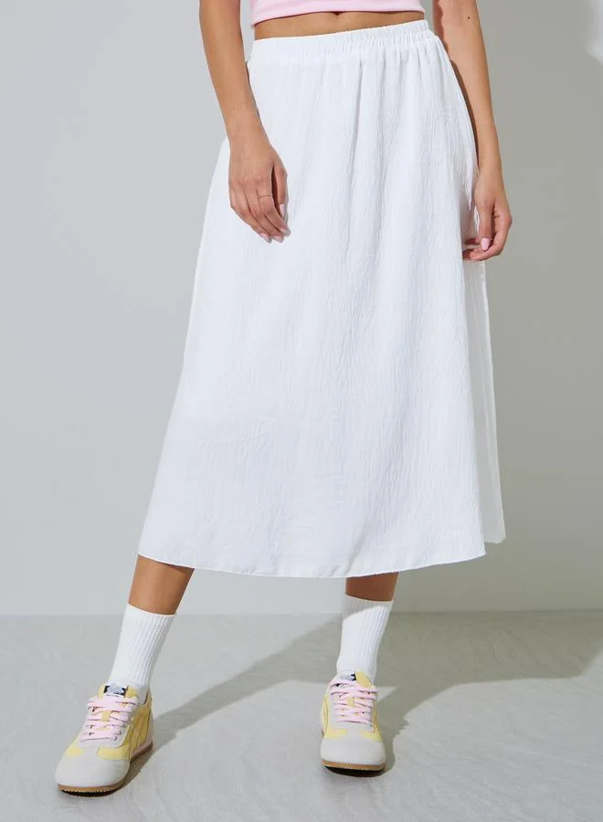 ستايلي White Textured A-Line Midi Skirt