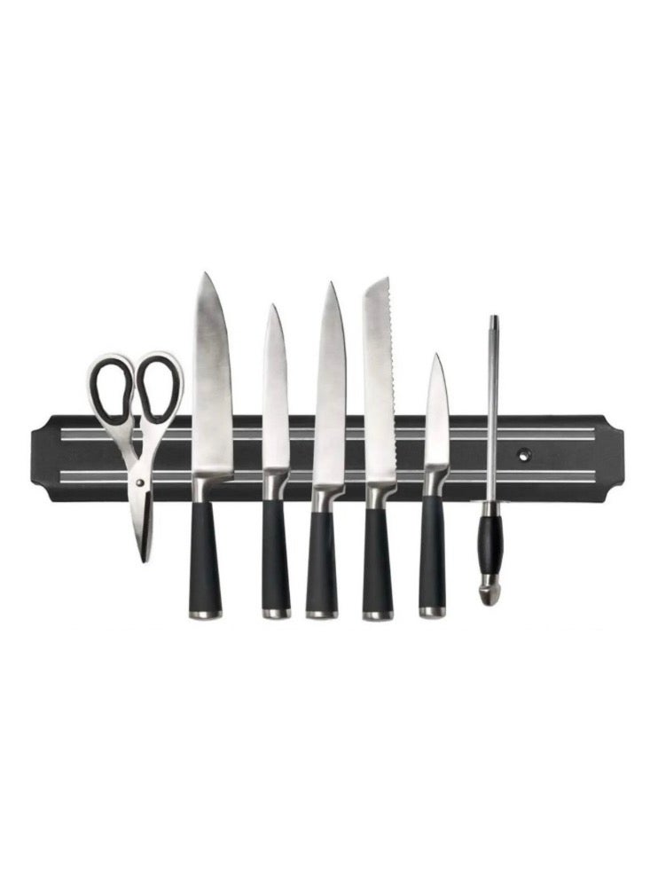 حامل السكاكين المغناطيسي على هيئة شريط تخزين لون اسود يثبت على الحائط متعدد الأغراض يُستخدم بشكل أساسي لتنظيم وتخزين الأدوات المعدنية مفيد في المطبخ لأواني المطبخ المعدنية سكاكين او ملاعق او خفاقات و غيرها مما يساعد على توفير مساحة في الادراج و يبعد الادوات المعدنية الخطرة بعيداً عن متناول الأطفال او في المستودع او المرآب او الورشة لتنظيم المعدات اليدوية المعدنية الصغيره مثل المفكات الشواكيش والمفاتيح مما يبقيها منظمة ومرئية ايضا أماكن أخرى يمكن تثبيته في المكاتب و غرف الغسيل أو حتى المداخل لتعليق المفاتيح أو أي أشياء معدنية أخرى او غرفة الحارس او في مواقف السيارات لوضع المفاتيح فهو حل تخزين عملي وموفر للمساحة لأي شيء معدني يمكن أن ينجذب للمغناطيس طول الحامل 33 سم - Image 1