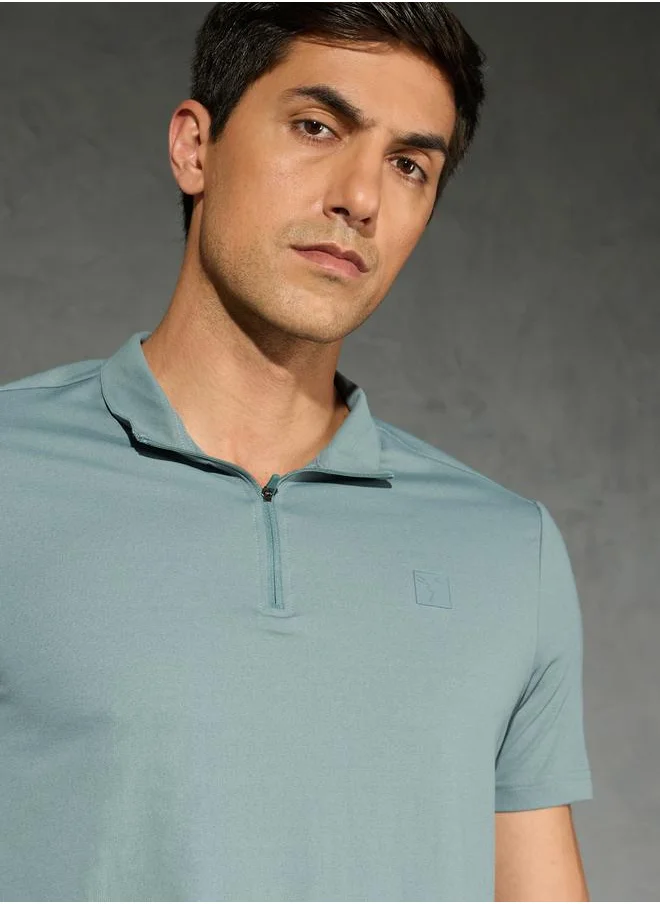 تكنوسبورت Technosport Solid 4-Way Stretch Half Zip Front Slim Fit Polo T-Shirt