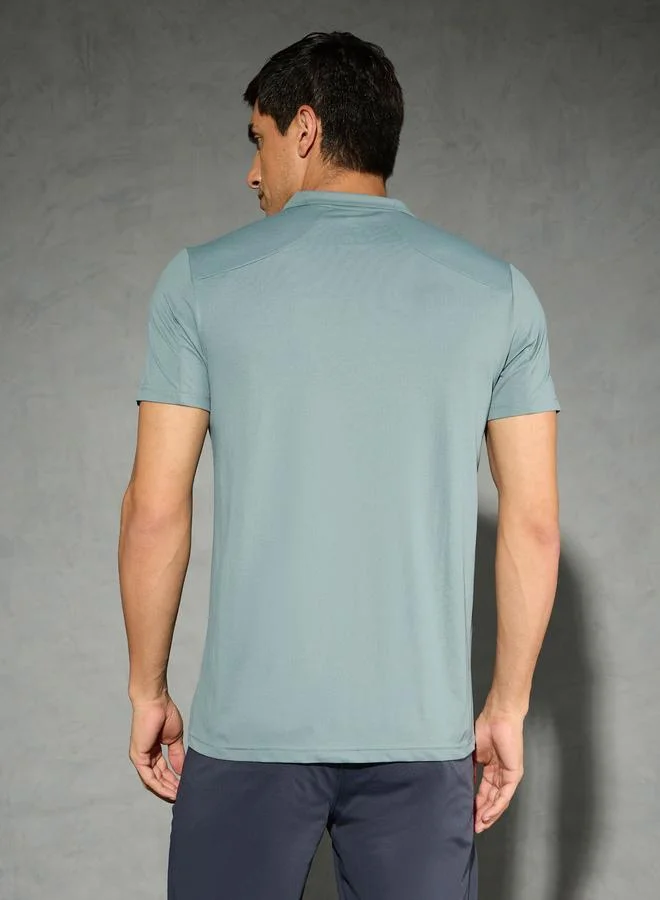 Technosport Technosport Solid 4-Way Stretch Half Zip Front Slim Fit Polo T-Shirt