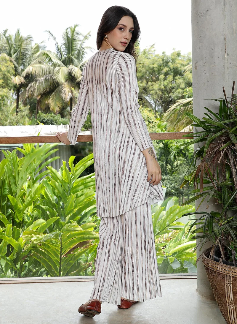 QISSA  Women's Gaze-Imprint Pleated Kurta Set For Ethnic Wear | Round Neck, Long Sleeves | Abstract Print Pleated Woven Fabric | 2 Piece Kurta Set Designed For Casual & Daily Wear | White & Brown for Women | Best Price UAE