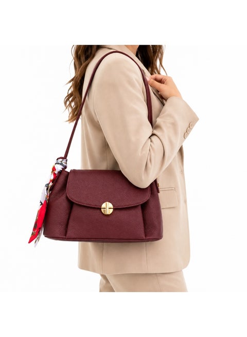 A stylish and modern women's shoulder bag with a metal clasp and practical space for everyday use.