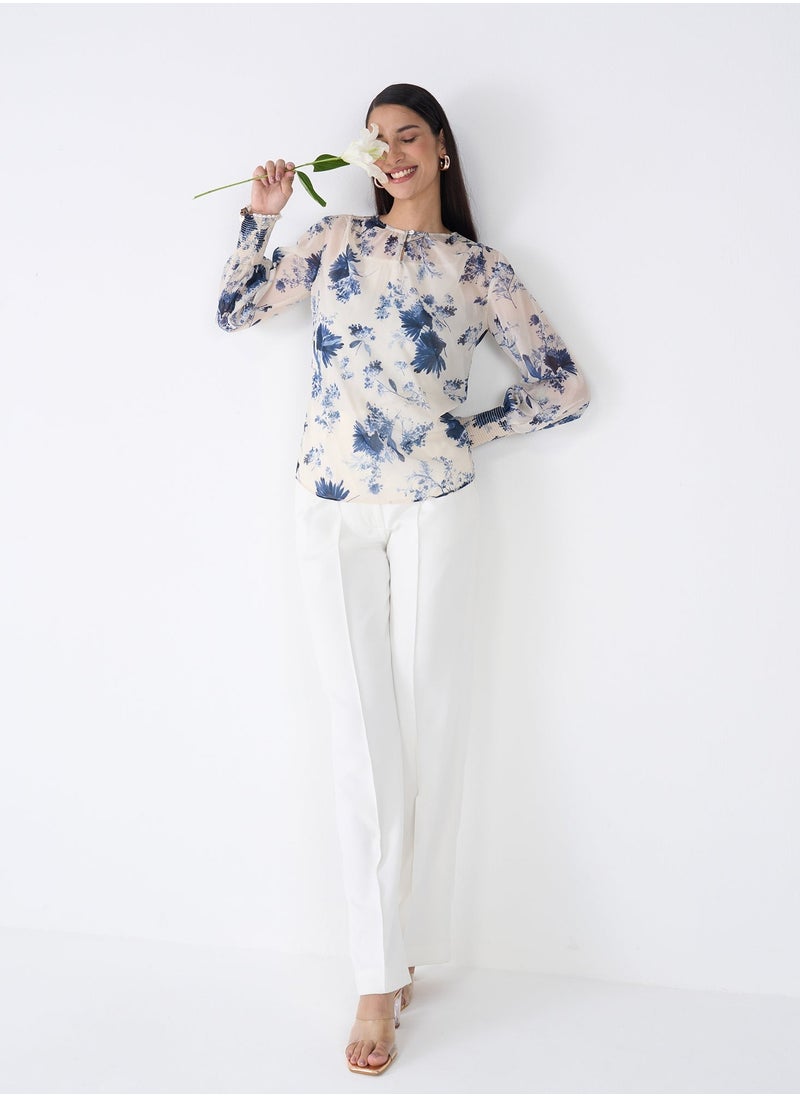 Salt Attire Blue and White Floral Pattern Top with Classic Round Neckline, Keyhole Opening, and Stylish Full Length Smocked Sleeves Ideal for Spring and Summer Outfits  - Image 4