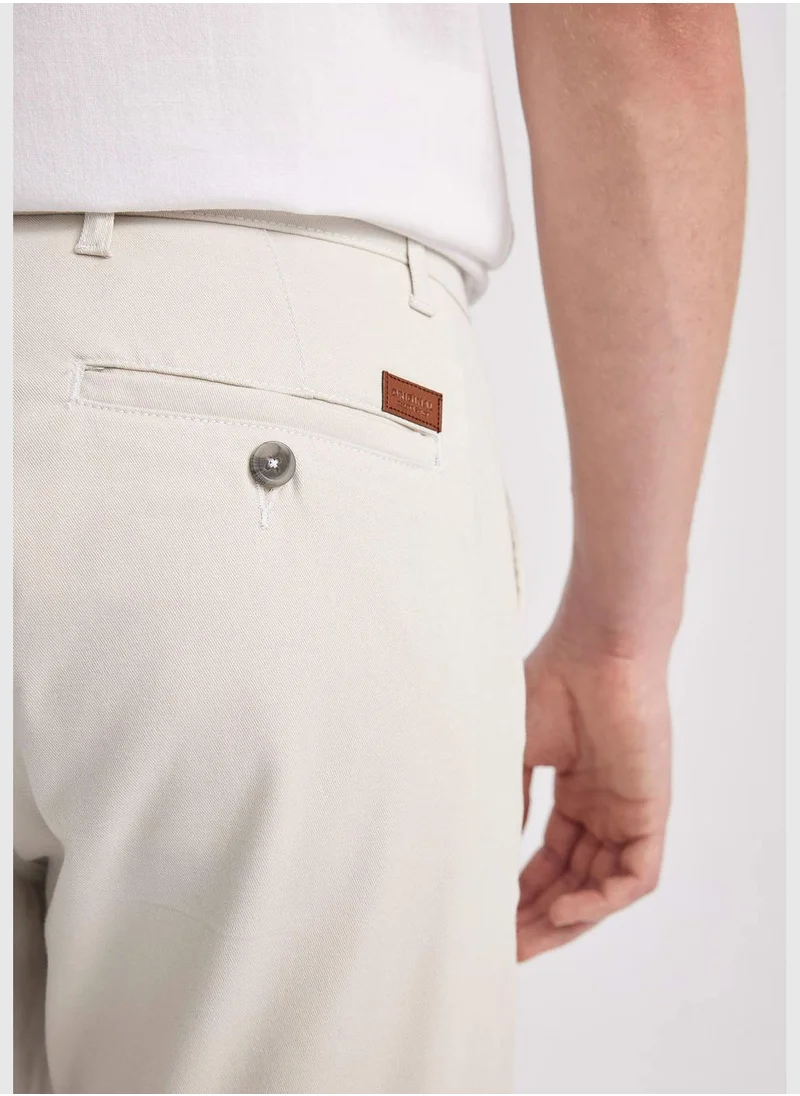 ديفاكتو Man Carrot Fit Chino Trousers
