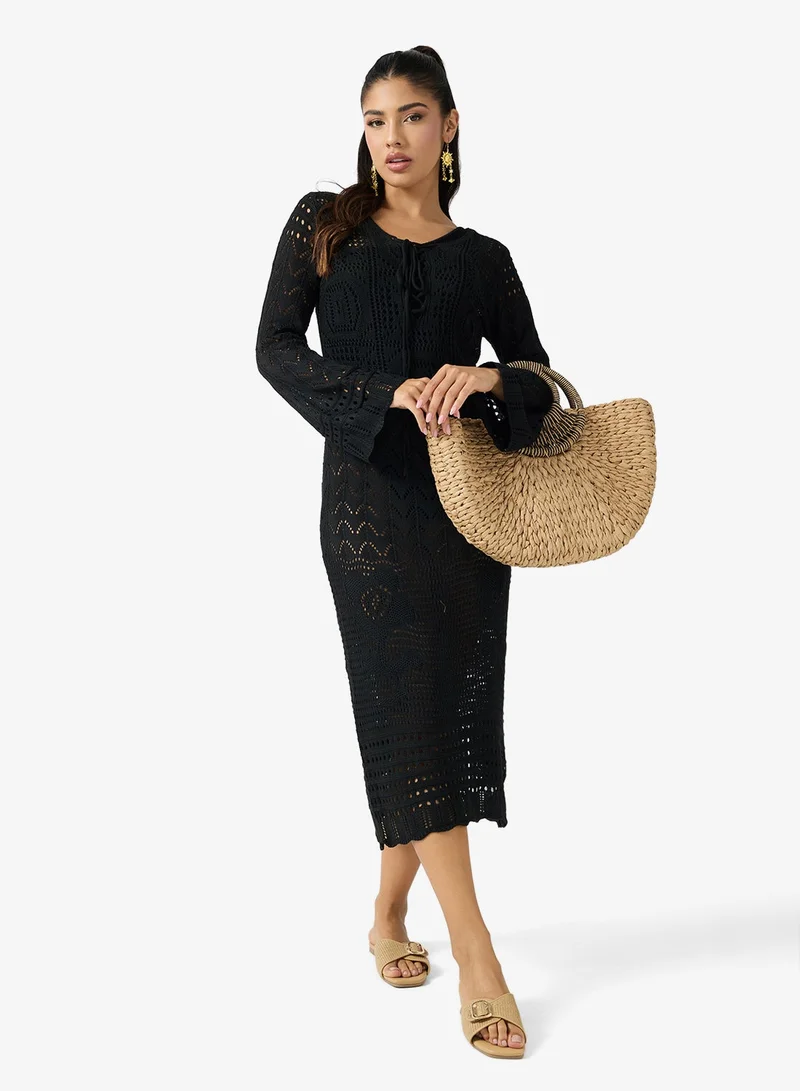 جينجر فستان شاطئ كروشيه بتفاصيل ربط