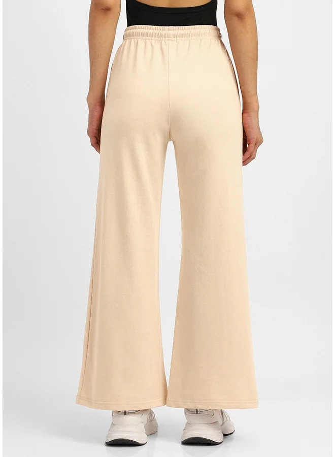 جونبيري بنطلون رياضي واسع الساق من القطن الخالص بلون بيج للنساء