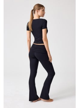 Los Ojos x Melodi Black Flared Leg Jersey Trousers  - Image 2