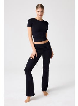 Los Ojos x Melodi Black Flared Leg Jersey Trousers  - Image 1