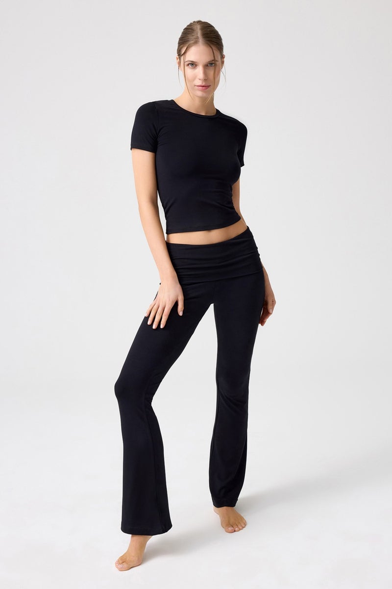 Los Ojos x Melodi Black Flared Leg Jersey Trousers  - Image 1