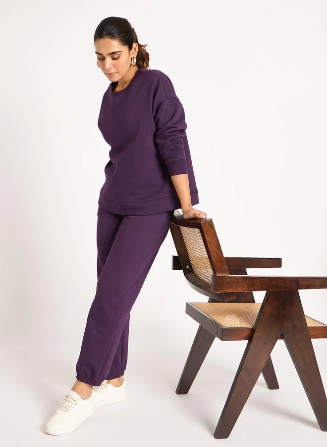 Femmella  Women Purple Fleece Joggers for Women | Best Price UAE