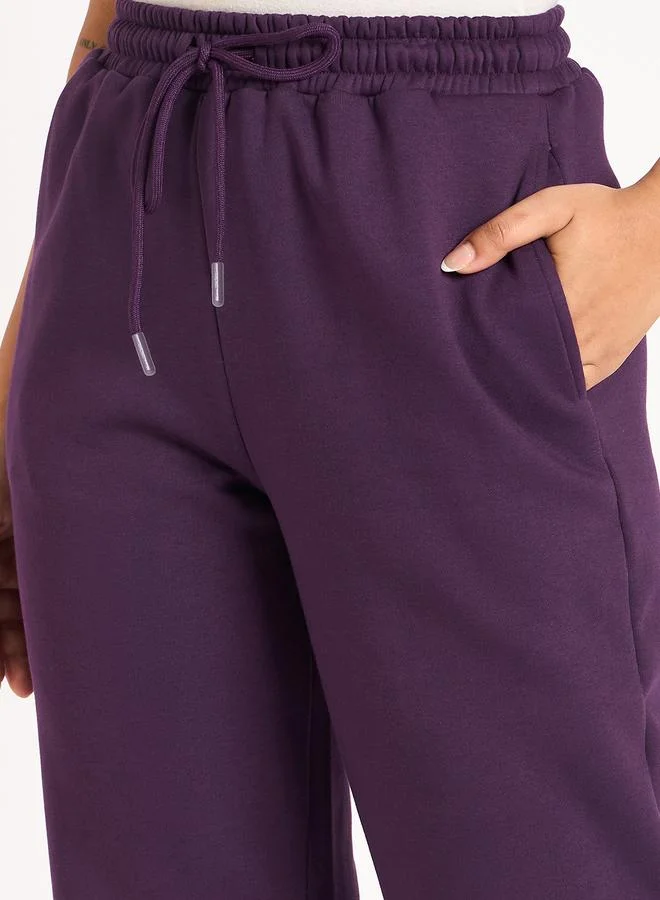 Femmella  Women Purple Fleece Joggers for Women | Best Price UAE