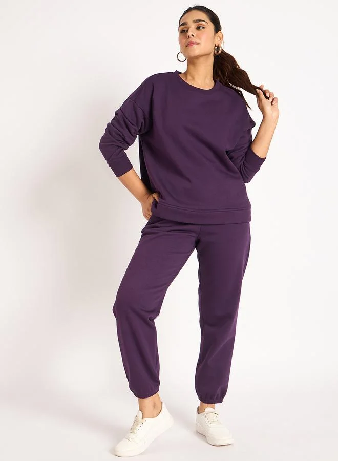 Femmella  Women Purple Fleece Joggers for Women | Best Price UAE
