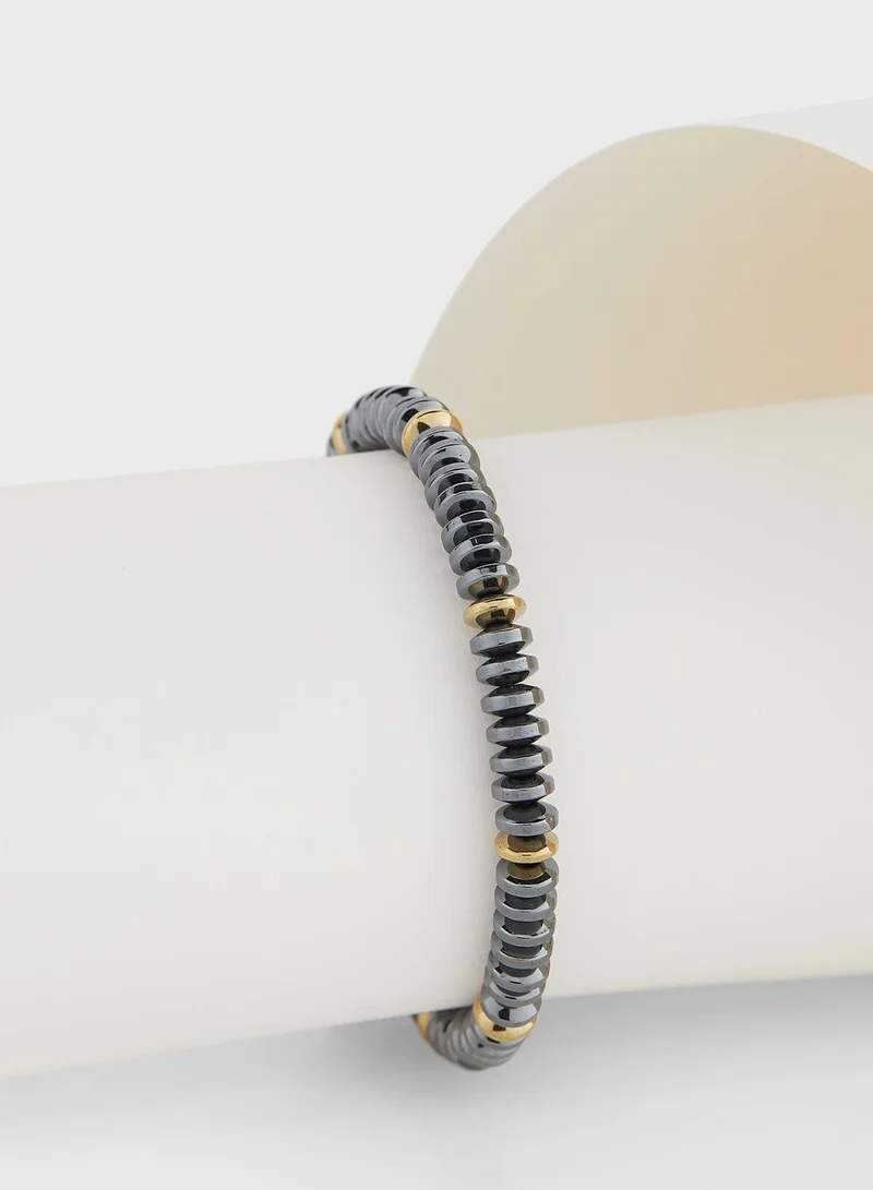 Seventy Five Metal Bead Adjustable Cord Bracelet