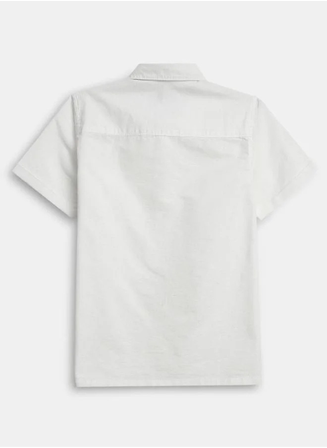 Bonkids Boy's shirts in regular fit white colour cotton fabric embellished pattern pull over closure woven weave type round collar type round neckline half sleeve length button down upper body wear type suitable for casual occasions – where comfort meets vibrant creativity!