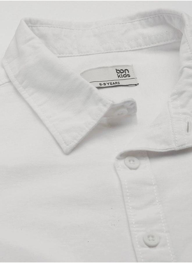 Bonkids - Boy's shirts in regular fit white colour cotton fabric embellished pattern pull over closure woven weave type round collar type round neckline half sleeve length button down upper body wear type suitable for casual occasions – where comfort meets vibrant creativity! - Image 1