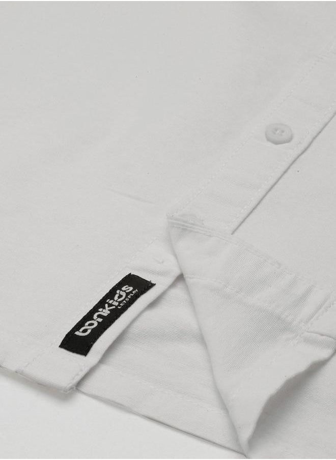 Bonkids - Boy's shirts in regular fit white colour cotton fabric embellished pattern pull over closure woven weave type round collar type round neckline half sleeve length button down upper body wear type suitable for casual occasions – where comfort meets vibrant creativity! - Image 1
