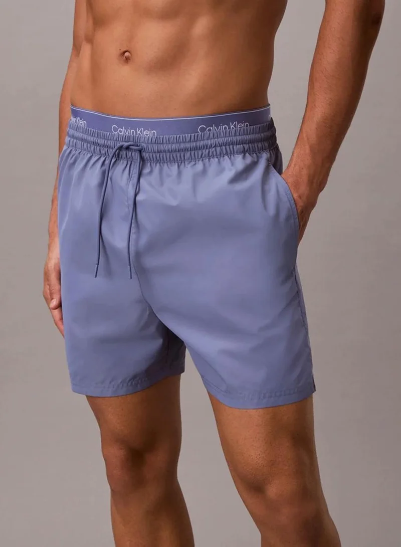 Calvin Klein Blue Tulip Medium Drawstring Swim Shorts - CK Essentials for Men | Best Price UAE