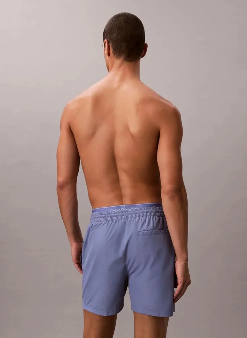 Calvin Klein Blue Tulip Medium Drawstring Swim Shorts - CK Essentials for Men | Best Price UAE