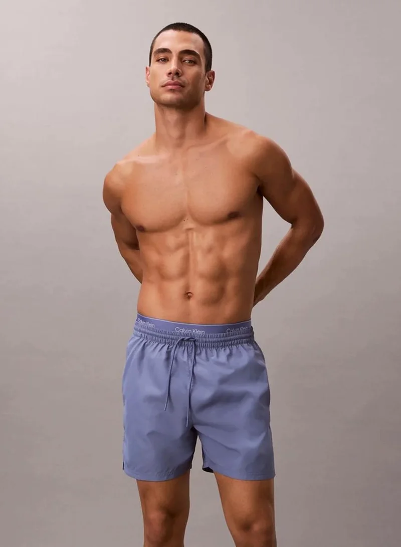 Calvin Klein Blue Tulip Medium Drawstring Swim Shorts - CK Essentials for Men | Best Price UAE