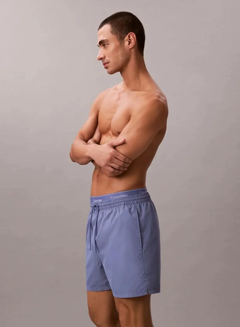 Calvin Klein Blue Tulip Medium Drawstring Swim Shorts - CK Essentials for Men | Best Price UAE