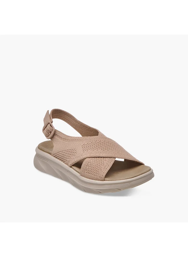 فلورا بيلا من شو إكسبرس Women's Textured Cross Strap Sandals with Buckle Closure