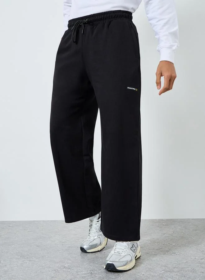 Men Black Embroidered Fleece Wide Leg Joggers