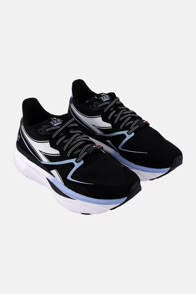 DIADORA أحذية تدريب نسائية أتمو V7000 مزودة بأربطة، سوداء - Image 1