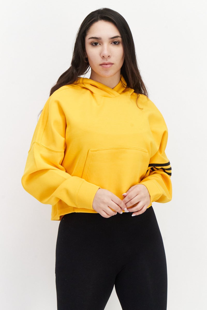 adidas Originals Women Sportswear Fit Embroidered Logo Outdoor Hoodie, Yellow - Image 1