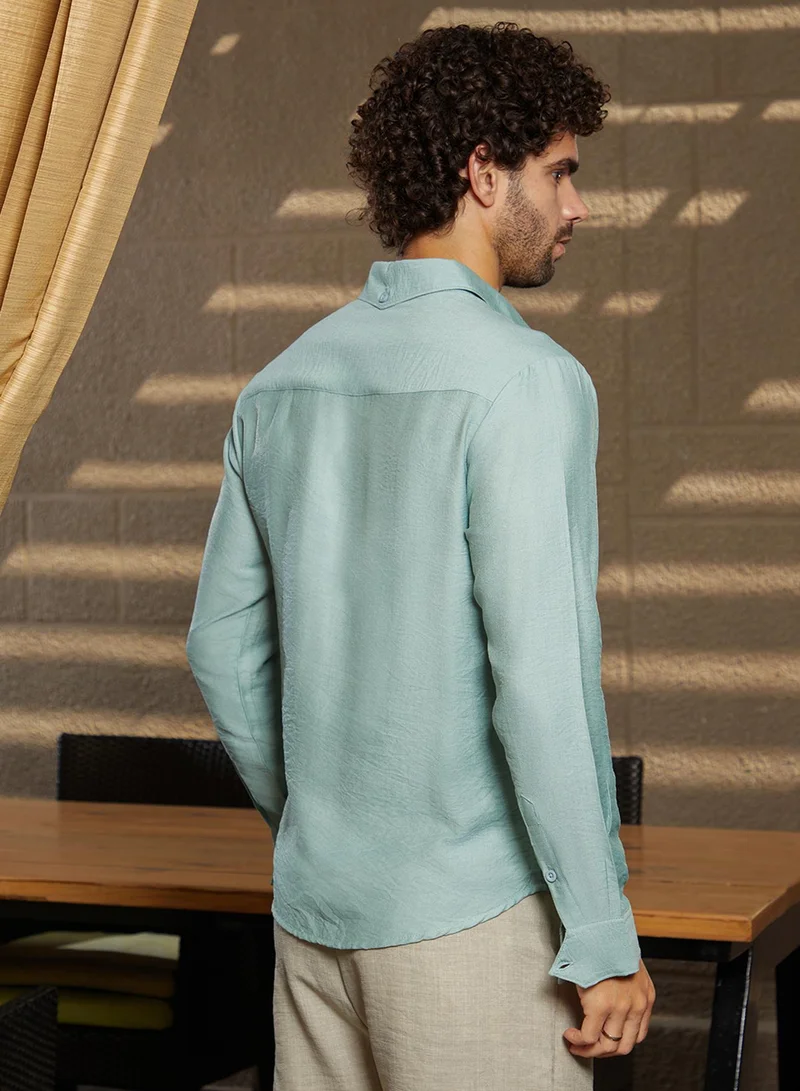 Campus Sutra Campus Sutra Men's Sage Green Breezy Wrinked Relaxed Shirt For Casual Wear | Spread Collar | Long Cuffed Sleeves | Button Closure | Shirt Crafted With Comfort Fit For Everyday Wear
