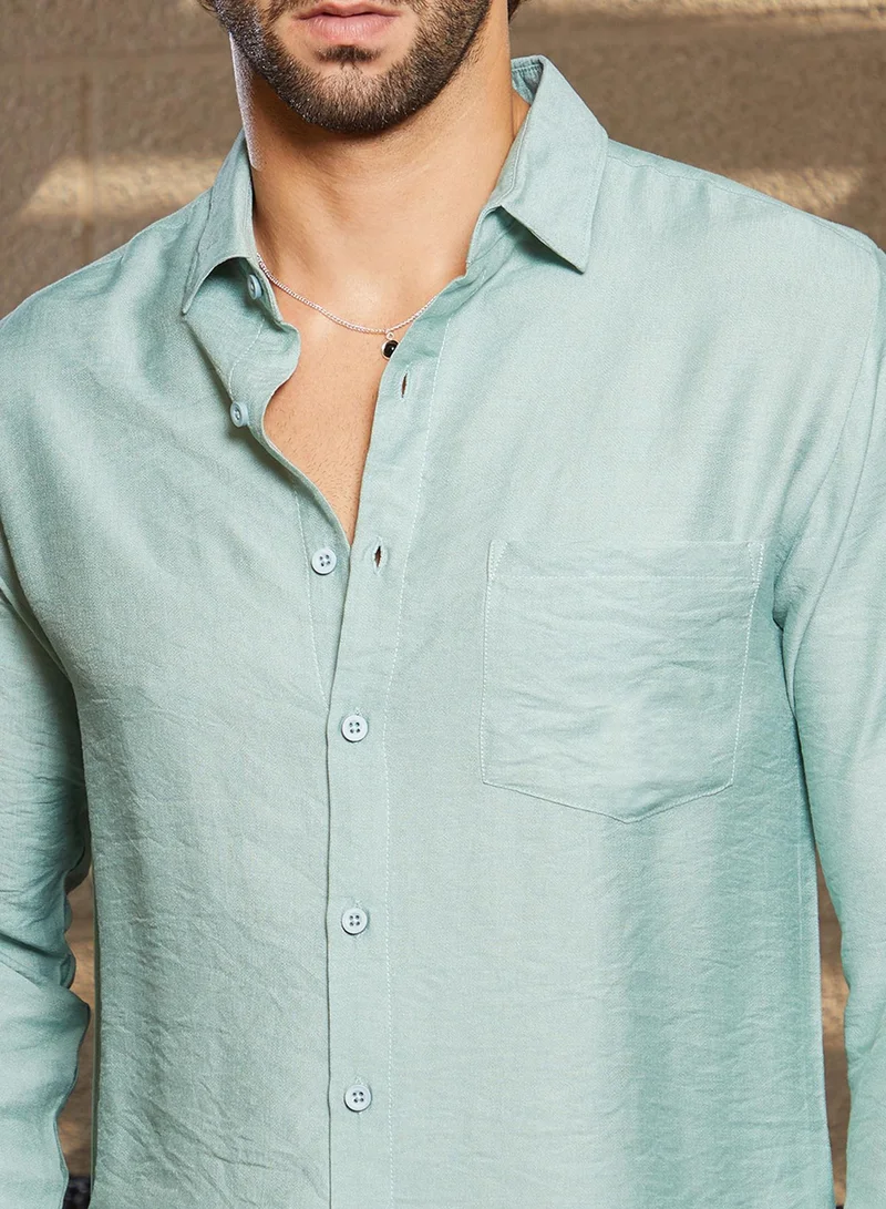 Campus Sutra Campus Sutra Men's Sage Green Breezy Wrinked Relaxed Shirt For Casual Wear | Spread Collar | Long Cuffed Sleeves | Button Closure | Shirt Crafted With Comfort Fit For Everyday Wear