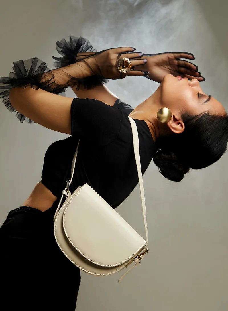 Haute Sauce Haute Sauce Women's Urban Curve Sling Bag For Casual Wear | Ivory White Colour | One-Size| Magnetic Closure | Vegan Leather Material | Detachable Sling | Handbag For Woman & Girls