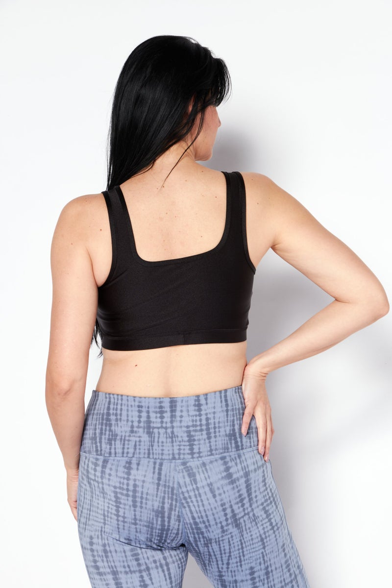 PUMA Women Tight Fit Brand Logo Sport Bra, Black - Image 4