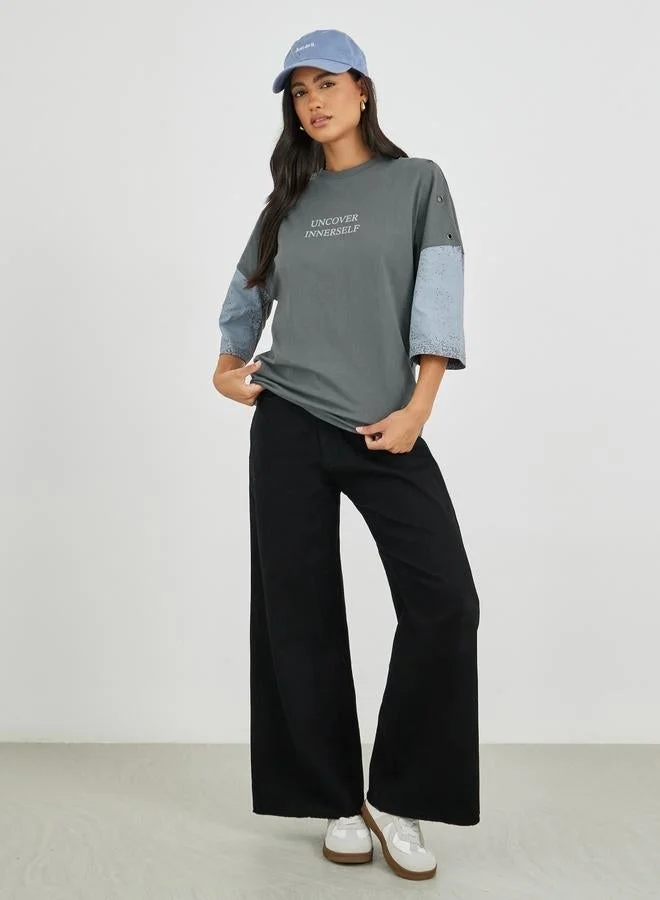 Styli Spray Painted Exaggerated Shoulder Oversized T-Shirt with Eyelet Detail