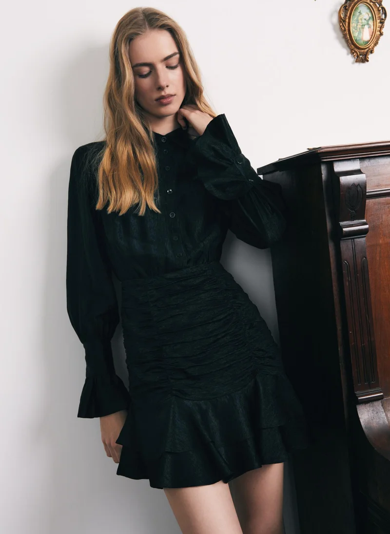 Lichi Mini dress with gathered skirt and small matching buttons