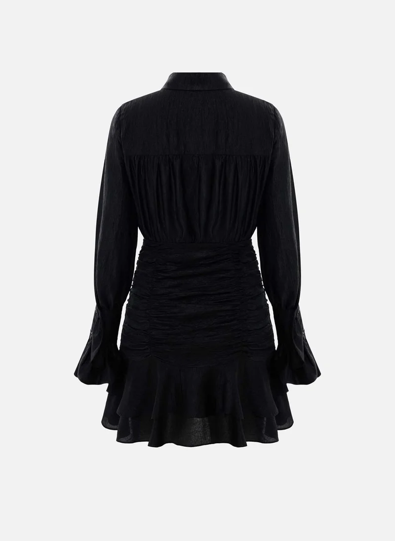 Lichi Mini dress with gathered skirt and small matching buttons