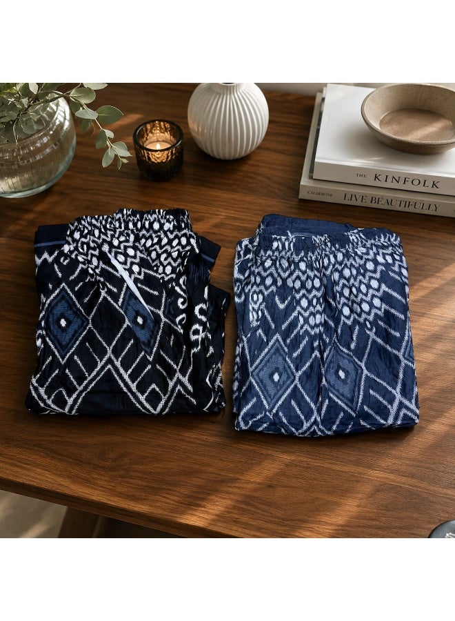 Men’s wrap-around sarong set consisting of two pieces in assorted patterned colors, made from soft and cool viscose fabric. Features a comfortable elastic waistband, a practical side pocket, and a loose, breathable design that provides excellent comfort for daily wear and sleeping. One-size design suitable for a variety of body sizes. - Image 2