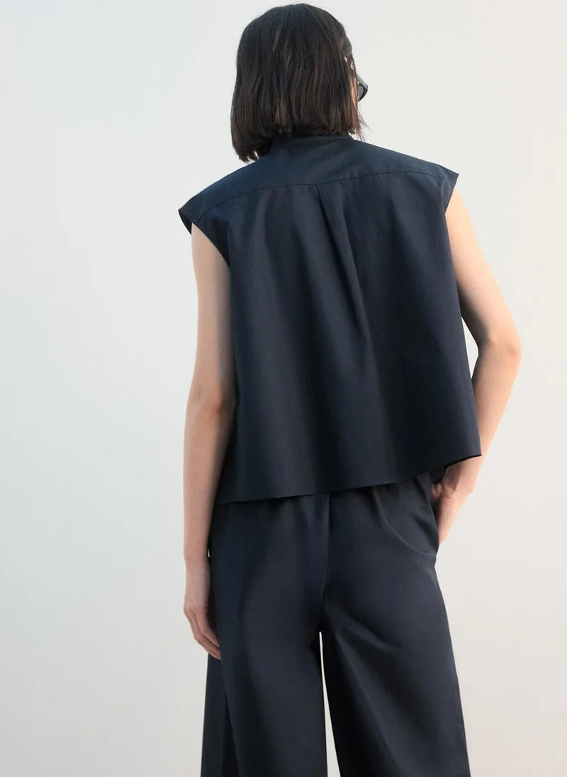 مانجو قميص قطني بلا أكمام