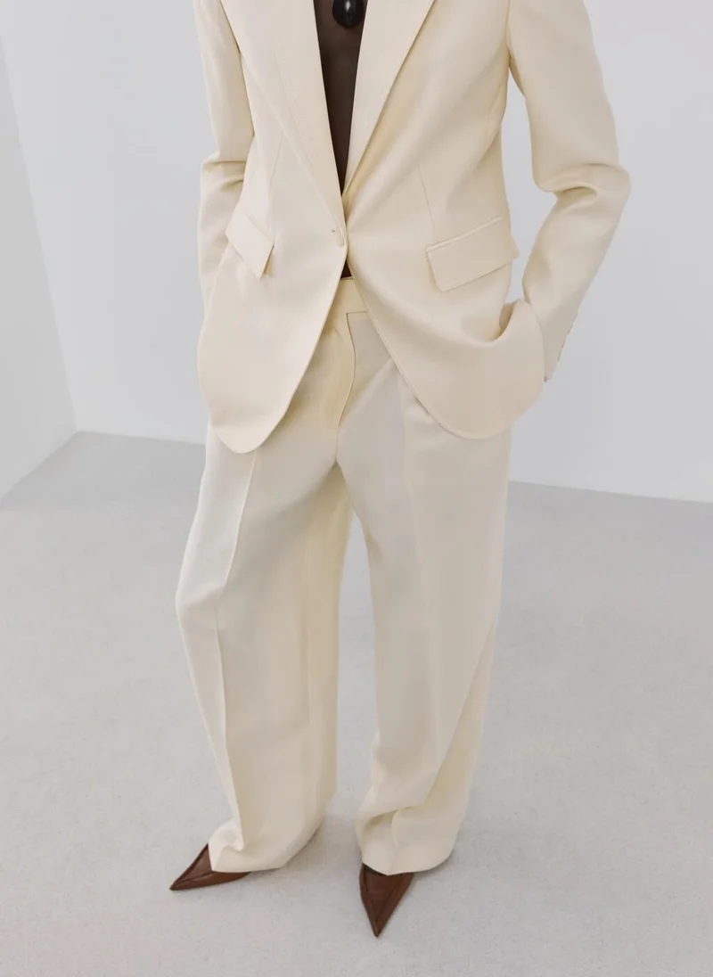 MANGO Low-rise lyocell trousers