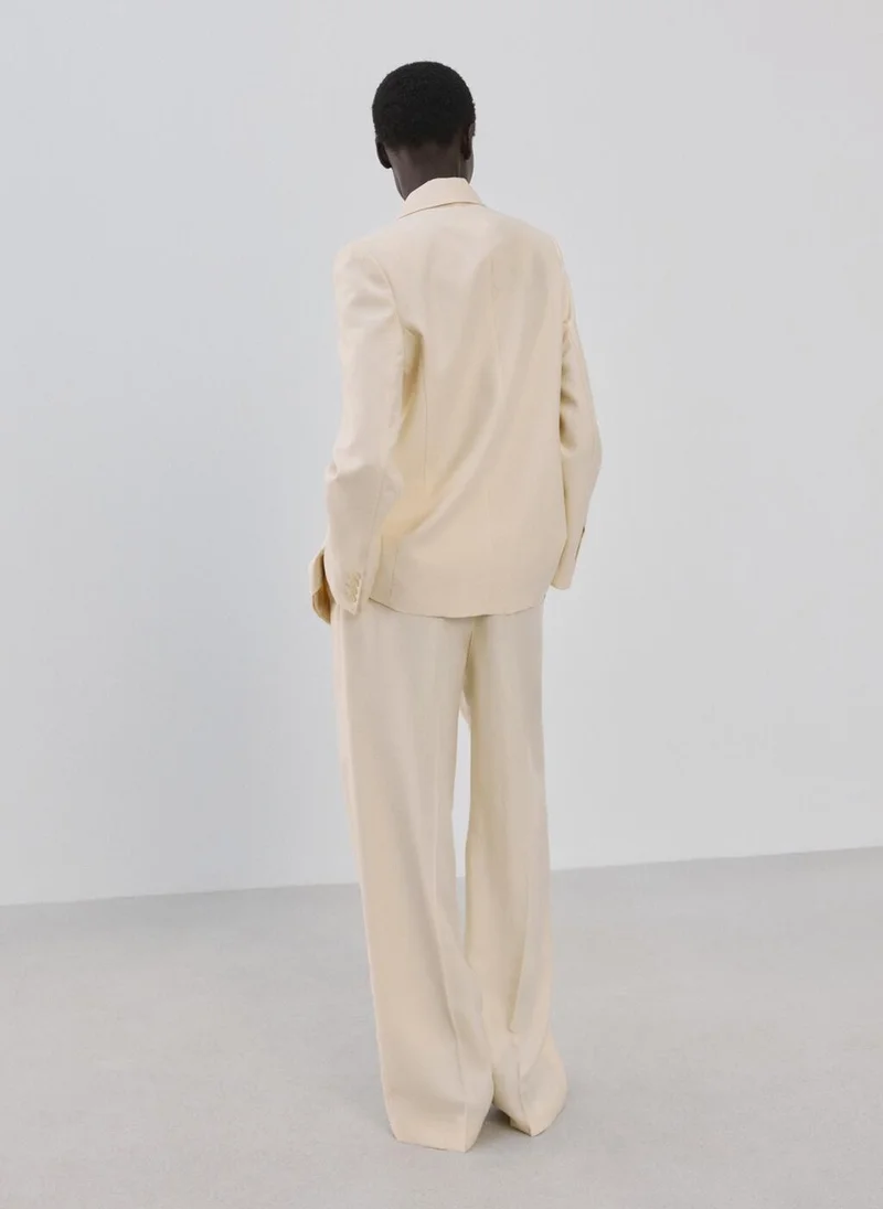 MANGO Low-rise lyocell trousers