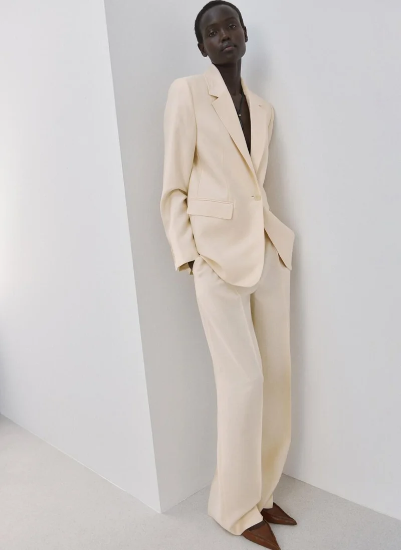 MANGO  Low-rise lyocell trousers for Women | Best Price UAE